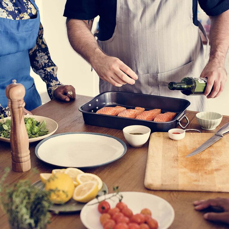 closeup of people preparing food for cooking